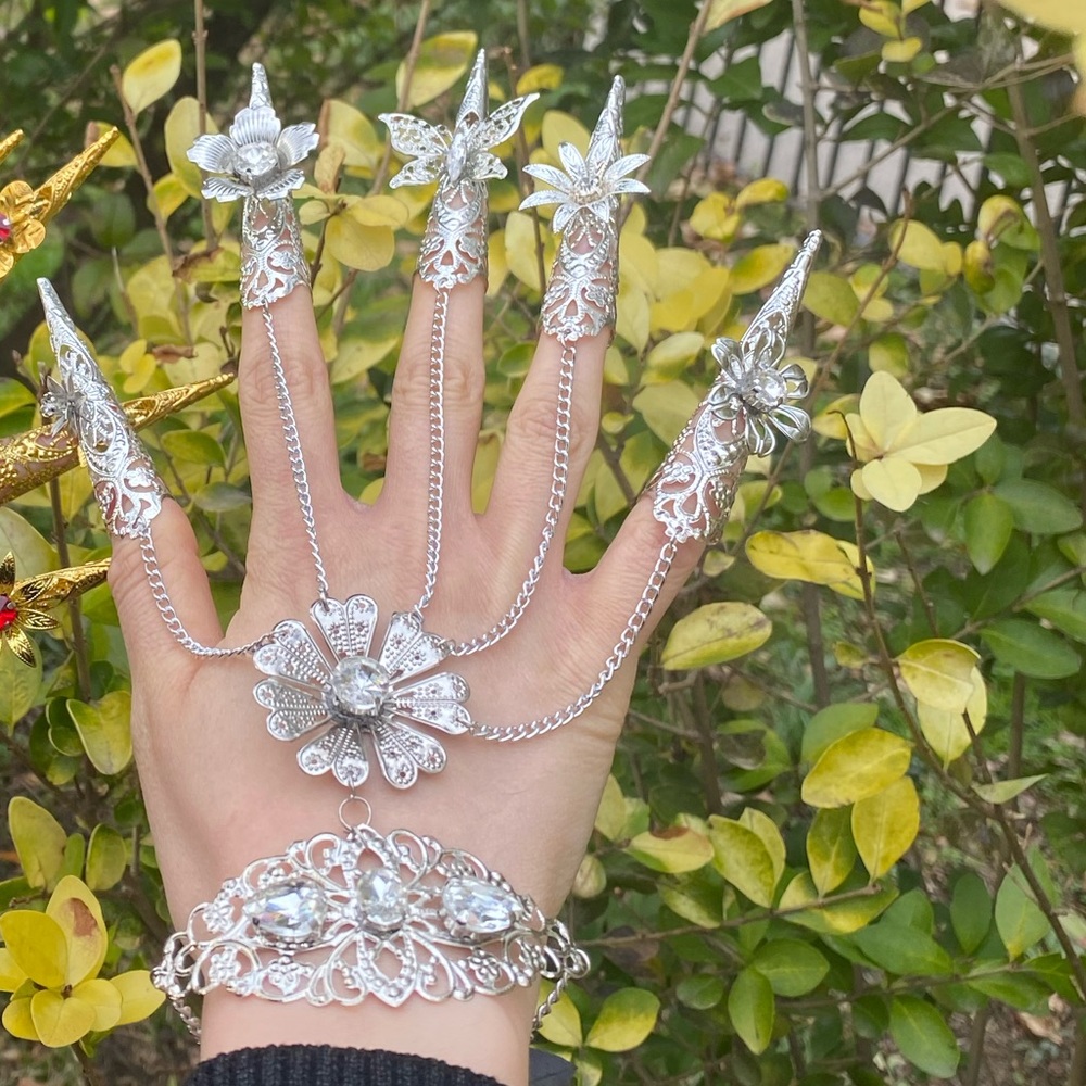 Handmade arm bracelet in silver color, made by me.